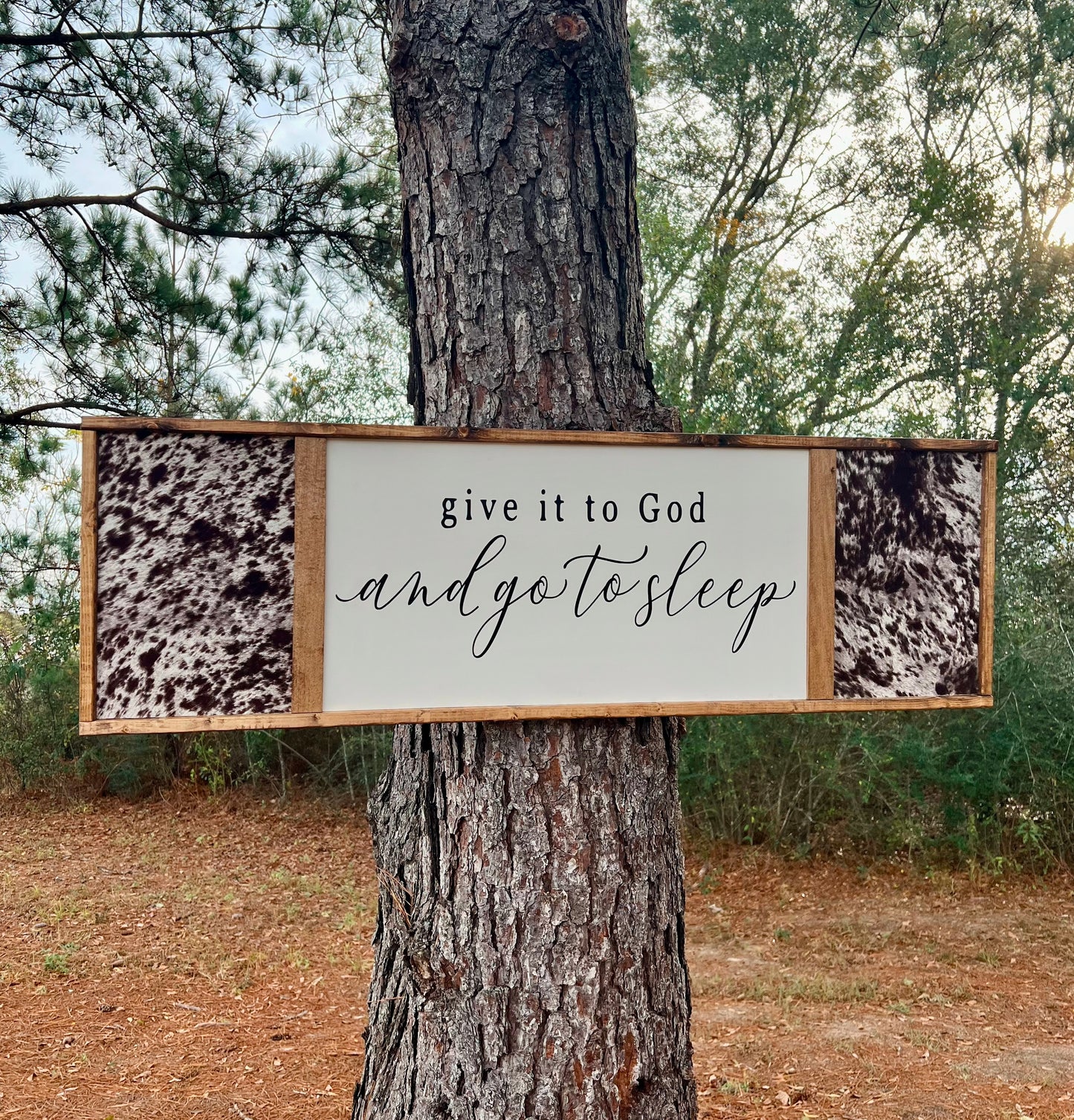 Give it to God and go to sleep wooden sign with cowhide on the sides - cowhide bedroom sign