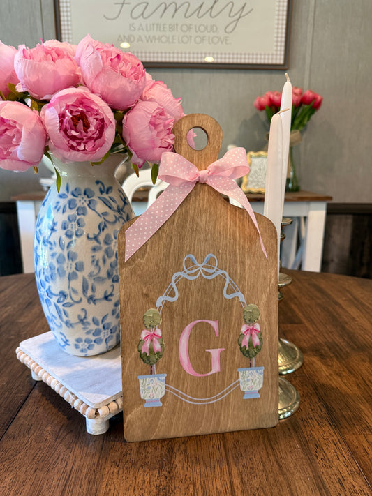 Pink topiary crest board