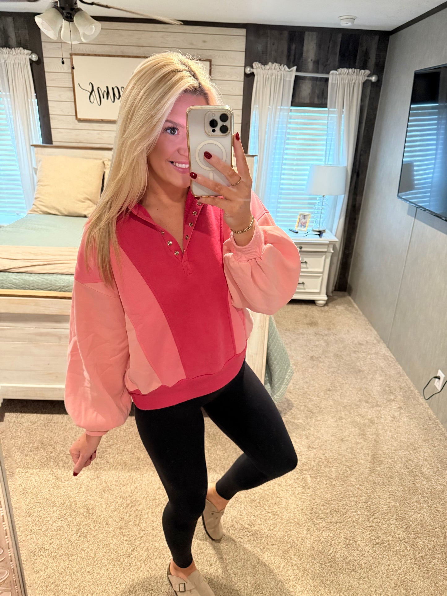 Three pink sweatshirt