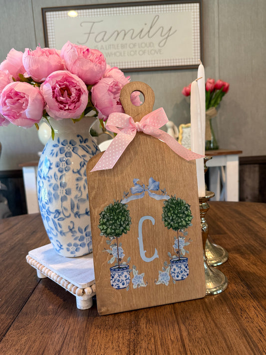 Blue topiary crest board