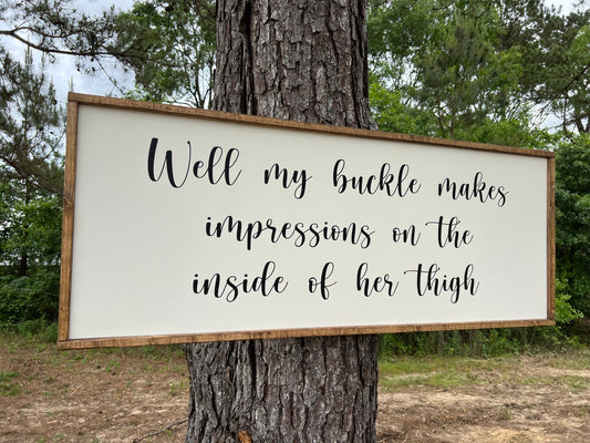 My buckle makes impressions on the inside of her thigh - feathered Indians- Tyler Childers wooden sign